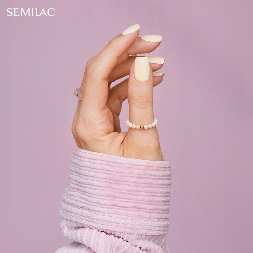półtransparentny lakier hybrydowy do letniego manicure