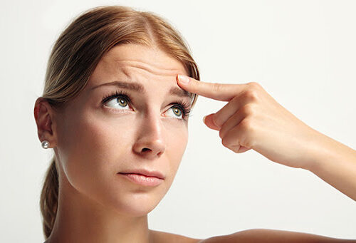 Zmarszczki mimiczne – skąd się biorą i jak się ich pozbyć?